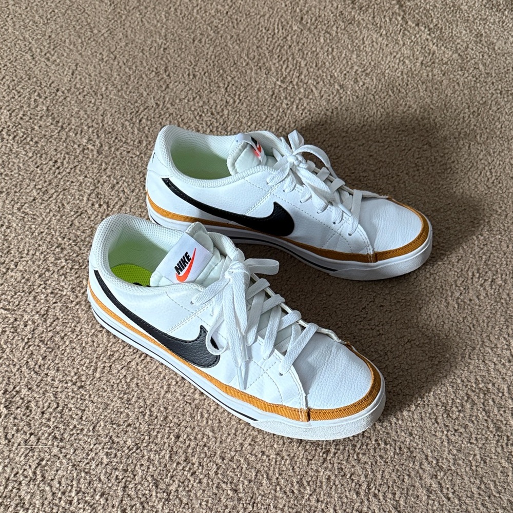 Women’sNike Legacy Court White and Gold Sneakers with Black Swoosh